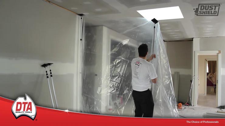 Man installing the DTA Dust shield barrier kit